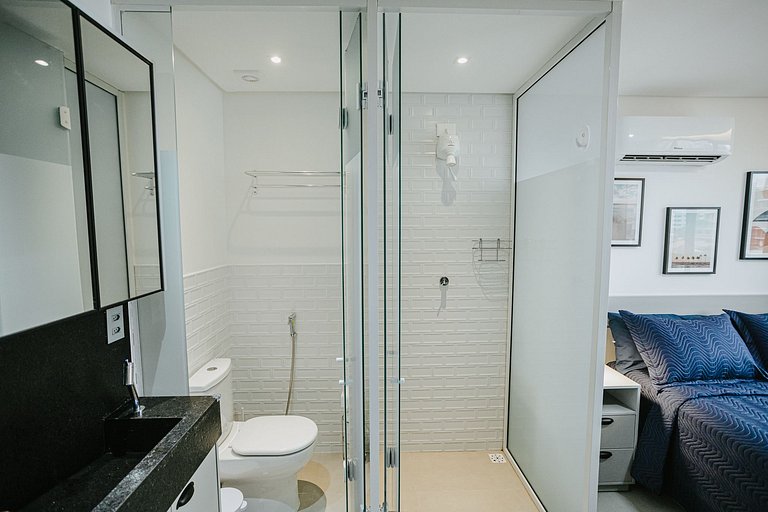 Studio moderno c/ piscina rooftop perto da praia