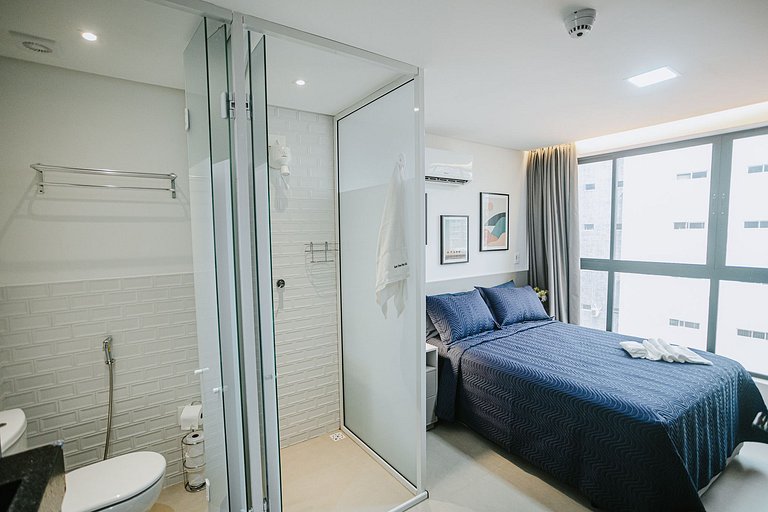 Studio moderno c/ piscina rooftop perto da praia