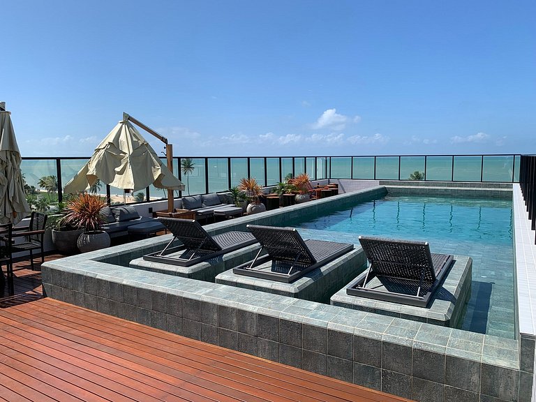 Flat espaçoso e confortável a 50m da praia