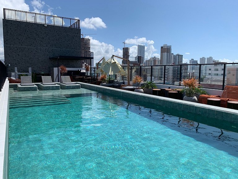 Flat espaçoso e confortável a 50m da praia