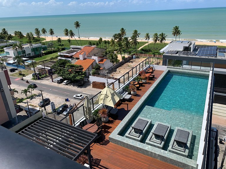 Flat espaçoso e confortável a 50m da praia