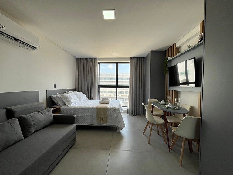 Flat espaçoso e confortável a 50m da praia