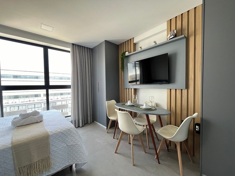 Flat espaçoso e confortável a 50m da praia