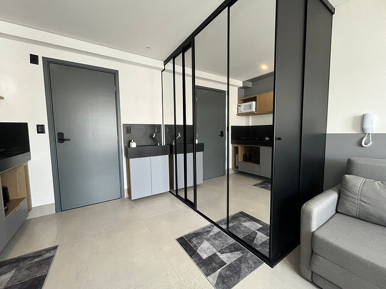 Flat espaçoso e confortável a 50m da praia