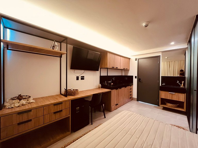 Flat com varanda a 50m da praia