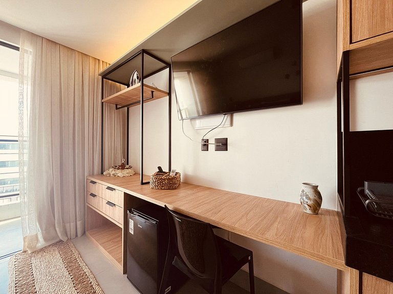Flat com varanda a 50m da praia