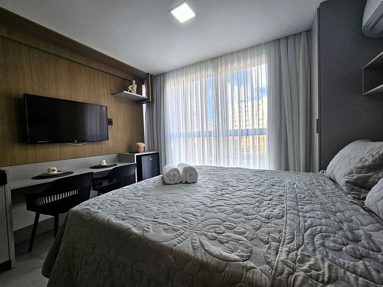 Studio com Piscina no Rooftop a 50m da praia