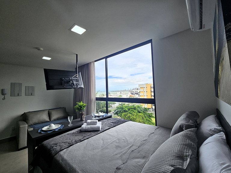 Belo flat 50m da praia no Bessa