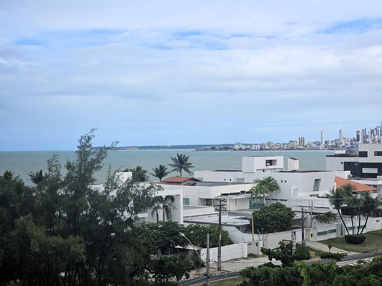 Belo flat 50m da praia no Bessa