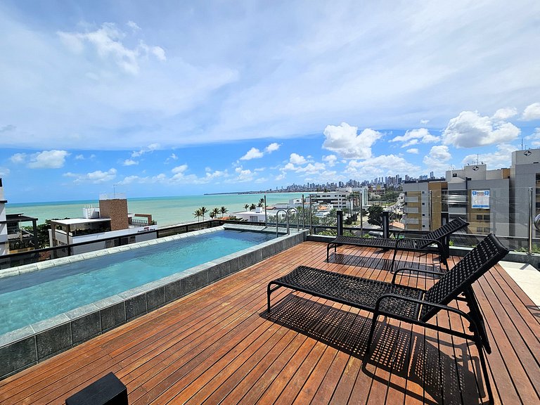 Belo flat 50m da praia no Bessa