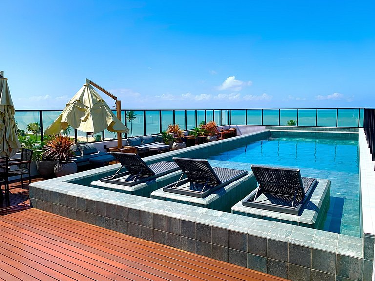Lindo Flat com 2 camas casal a 50m da praia