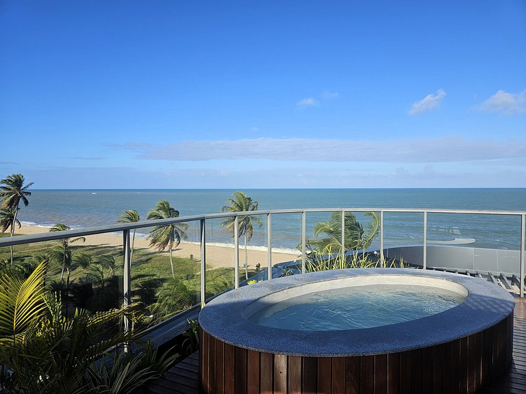 Flat "pé-na-areia" estilo Resort