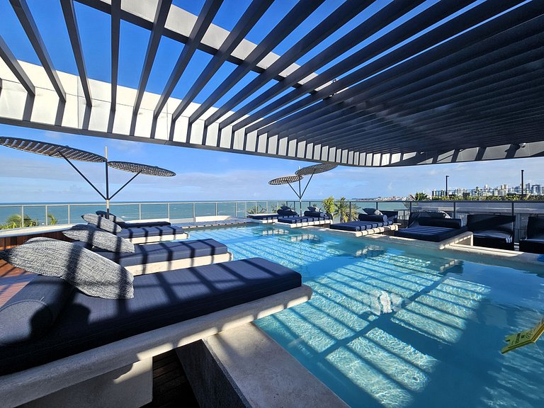Flat "pé-na-areia" estilo Resort