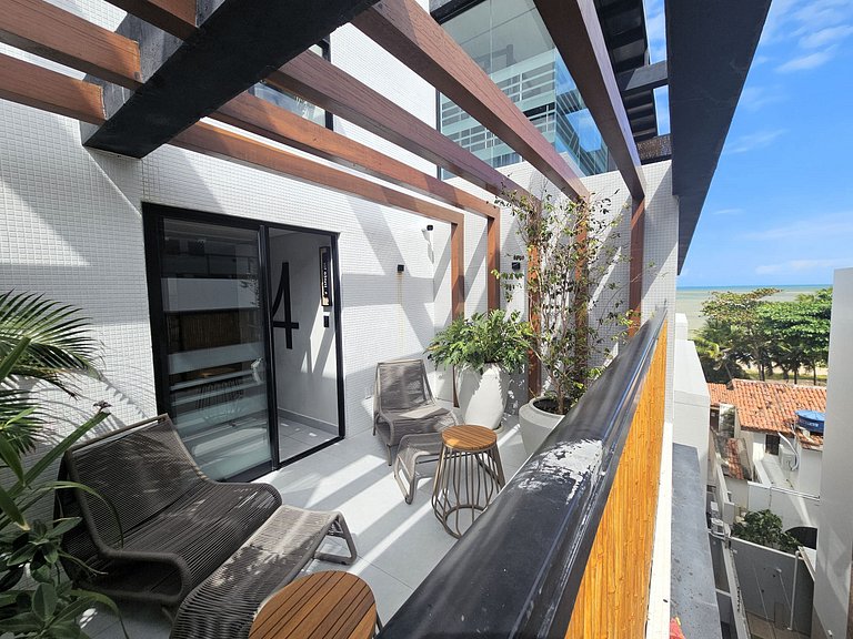 Flat "Pé na areia" com Varanda e Vista Mar