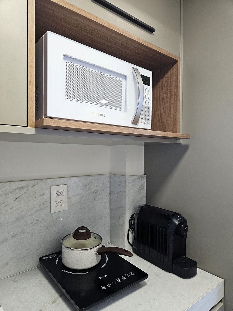 Flat "Pé na areia" com Varanda e Vista Mar