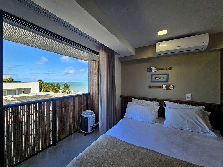 Flat "Pé na areia" com Varanda e Vista Mar