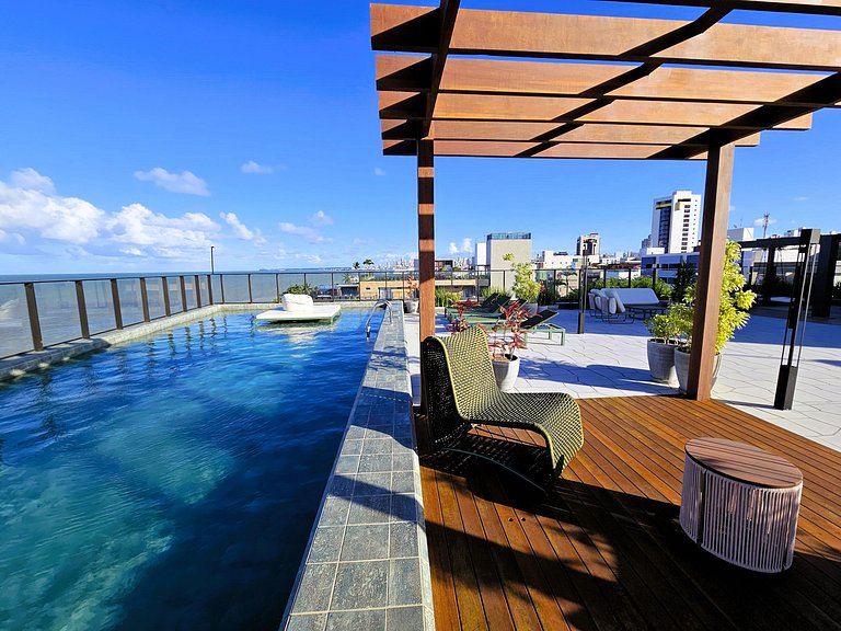 Belo Flat "pé na areia" no Jardim Oceania