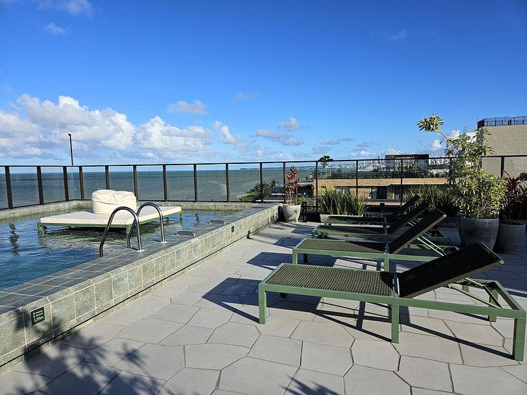 Belo Flat "pé na areia" no Jardim Oceania